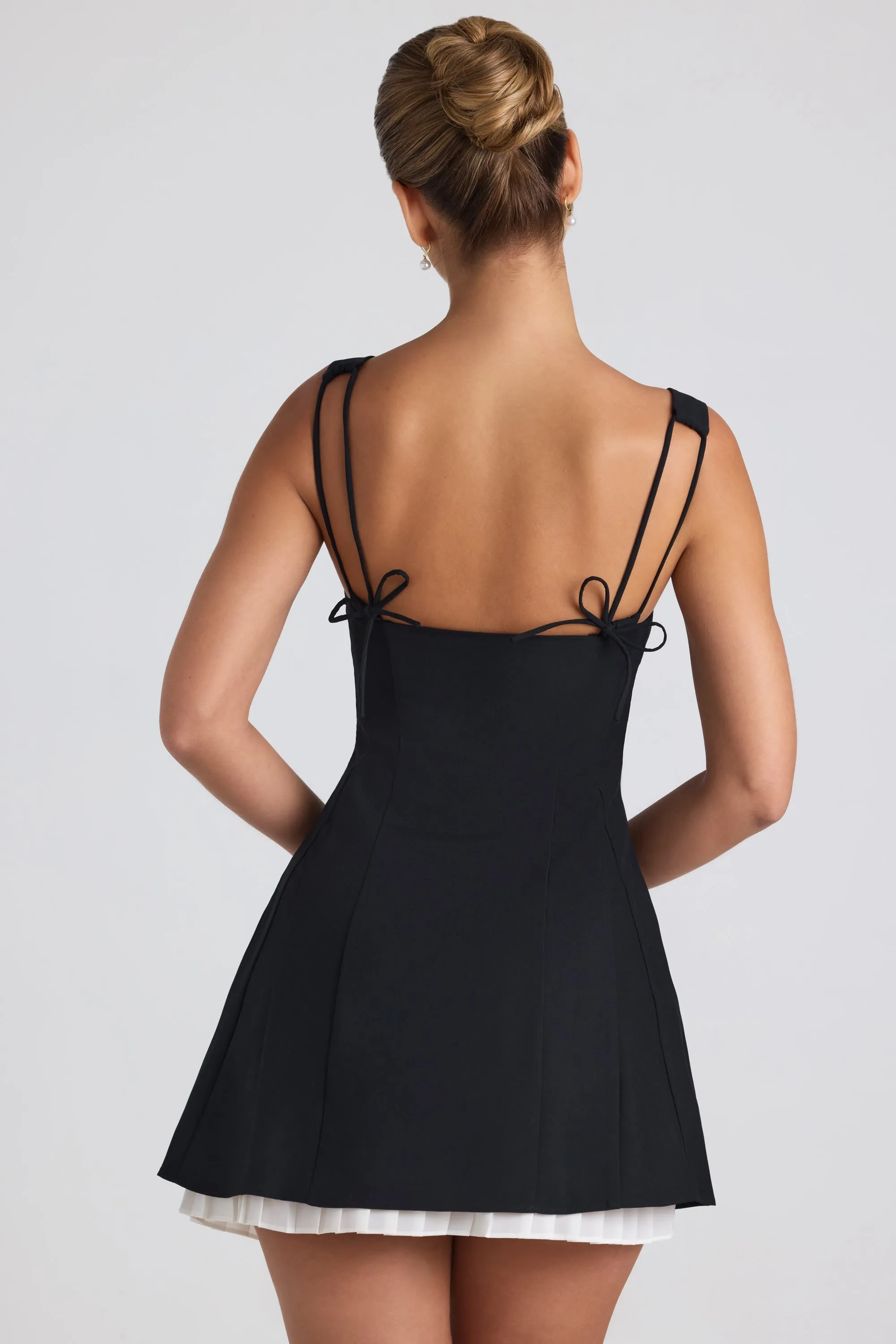Bow-Detail Pleated A-Line Mini Dress in Black sold by Oh Polly product image thumbnail 2