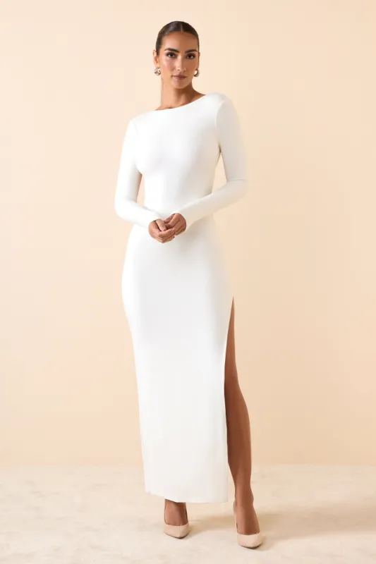 Long Sleeve Backless Maxi Dress in White made by Oh Polly