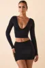 Modal Twist-Front Mid-Rise Mini Skirt in Black sold by Oh Polly