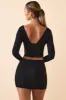 Modal Twist-Front Mid-Rise Mini Skirt in Black sold by Oh Polly