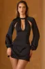 Cut-Out Open-Back A-Line Mini Dress in Black sold by Oh Polly
