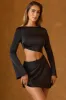 Asymmetric Cut-Out A-Line Mini Dress in Black sold by Oh Polly