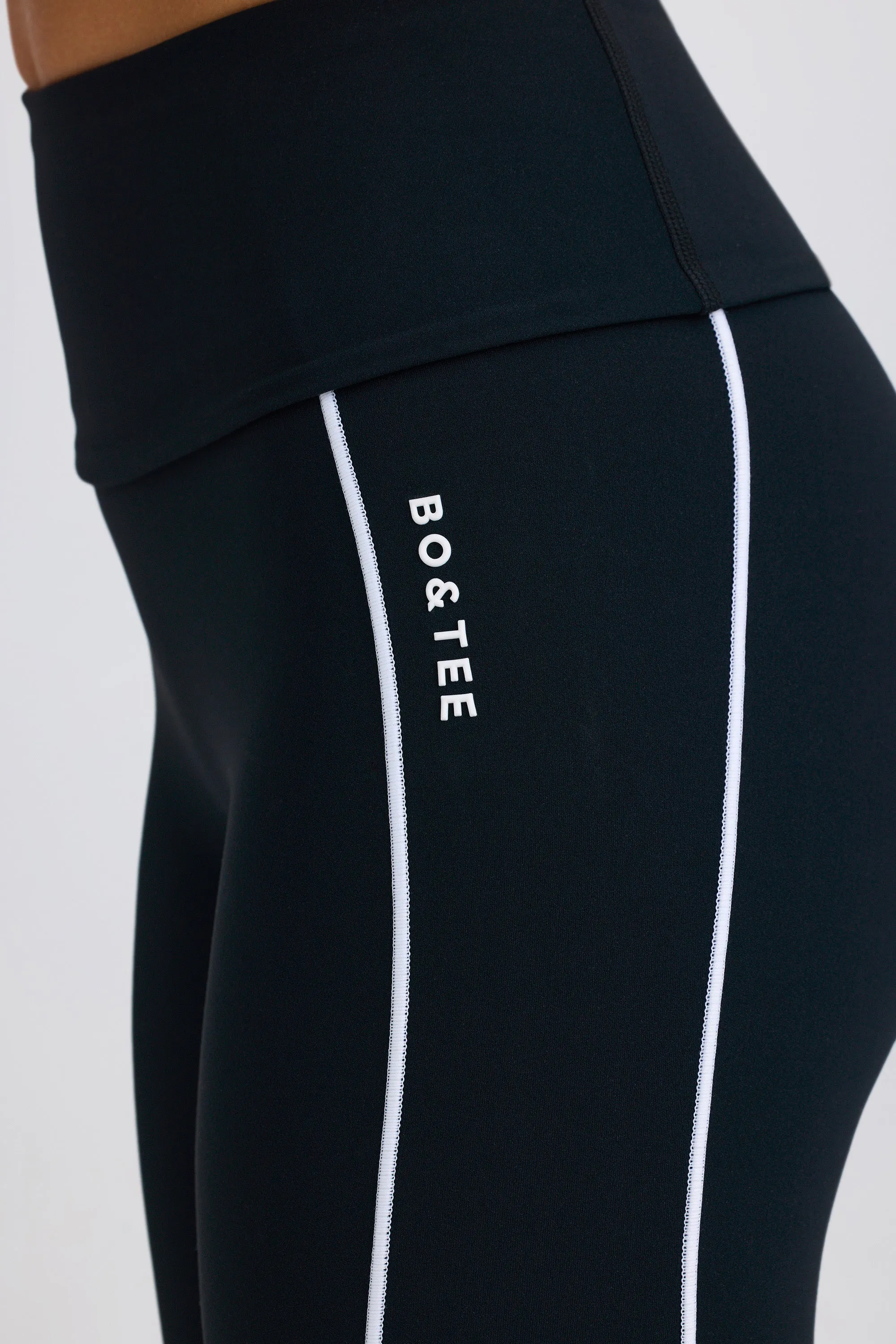 Petite Soft Active Foldover Flared Trousers in Black sold by Oh Polly product image thumbnail 4