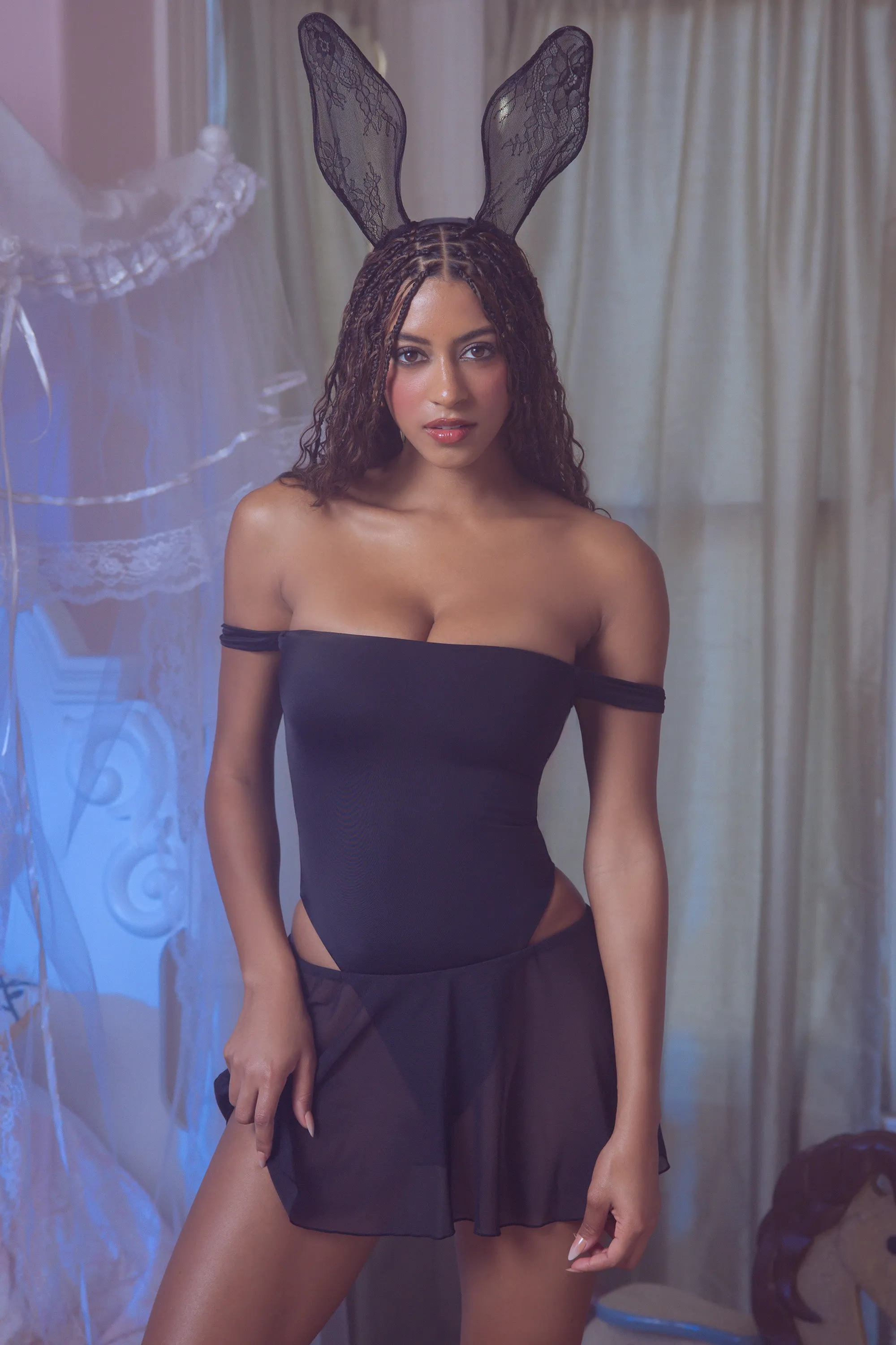 Off-Shoulder Layered Mini Dress in Black sold by Oh Polly