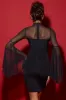 Waterfall-Sleeve Mini Dress in Black sold by Oh Polly