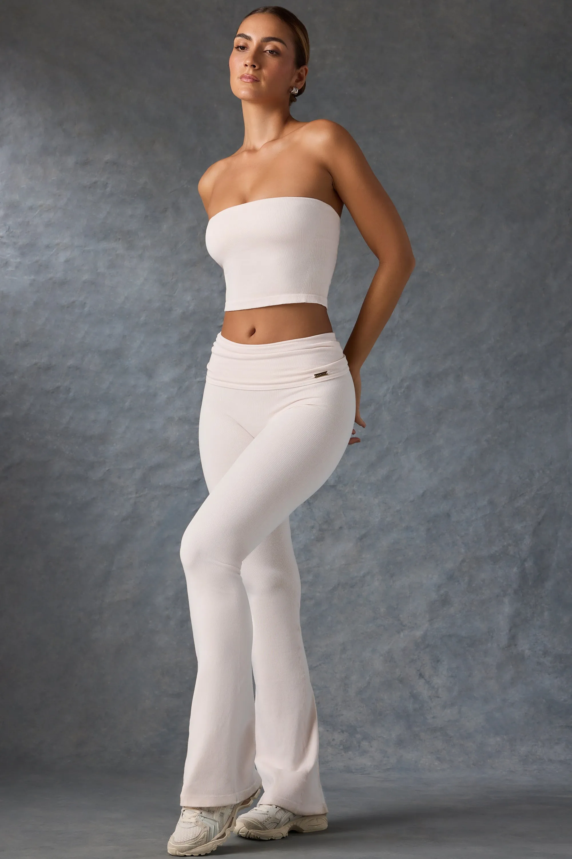 Foldover Flared Trousers in Washed Cream sold by Oh Polly