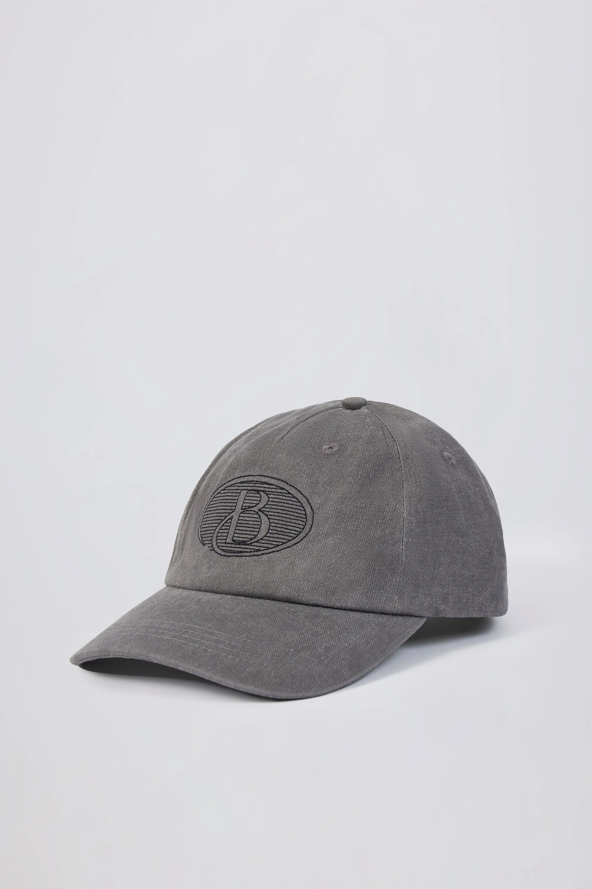 Baseball Cap in Washed Charcoal sold by Oh Polly