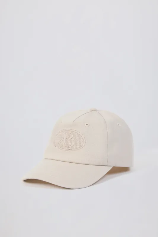 Baseball Cap in Washed Cream sold by Oh Polly