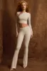 Asymmetric Draped Mid-Rise Flared Trousers in Light Grey sold by Oh Polly