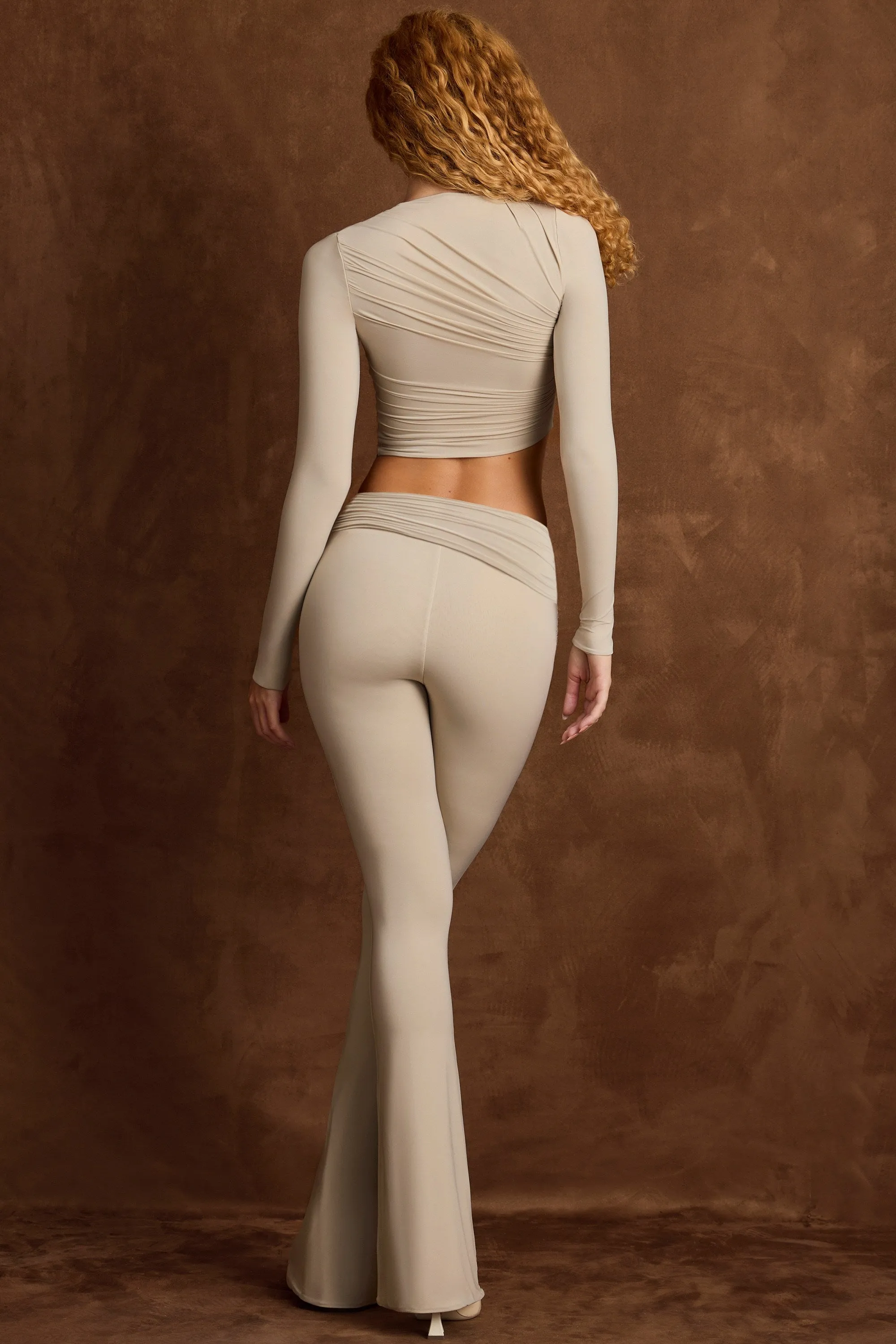 Asymmetric Draped Mid-Rise Flared Trousers in Taupe sold by Oh Polly product image thumbnail 3