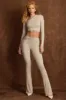 Asymmetric Draped Mid-Rise Flared Trousers in Light Grey sold by Oh Polly