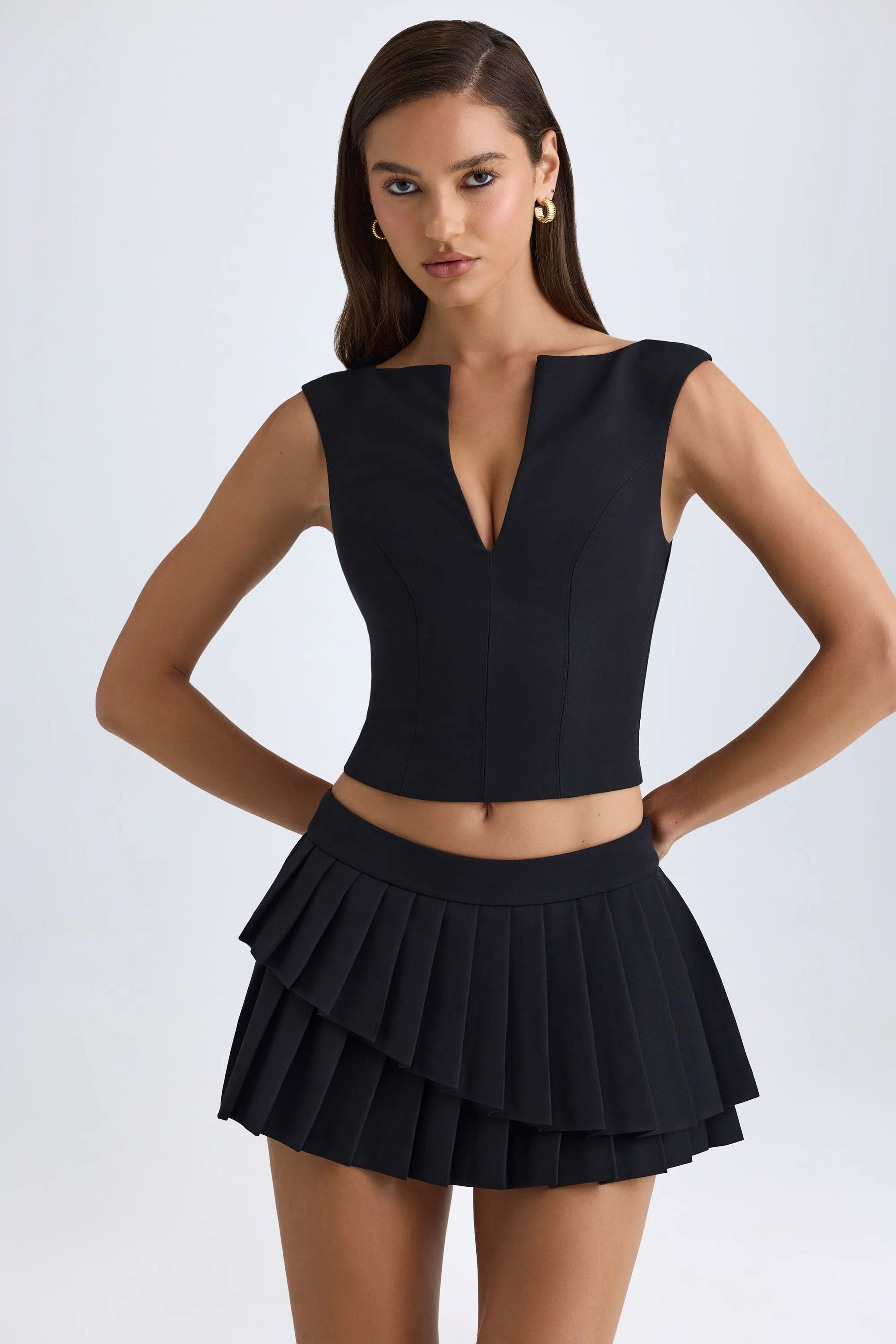 Layered Pleated Low-Rise Mini Skirt in Black sold by Oh Polly product image thumbnail 2