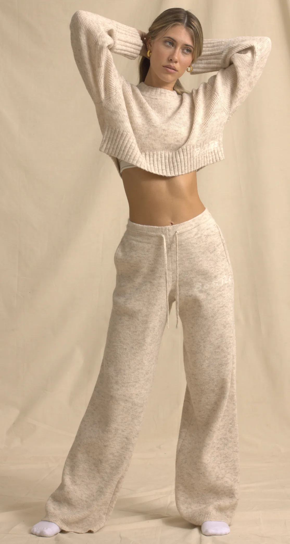 Ribbed Knit Mid-Rise Wide-Leg Joggers in Cream Marl sold by Oh Polly