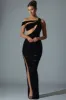 Embellished Asymmetric Cut-Out Gown in Black sold by Oh Polly