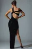 Embellished Asymmetric Cut-Out Gown in Black sold by Oh Polly