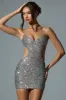 Embellished Cut-Out Mini Dress in Silver sold by Oh Polly