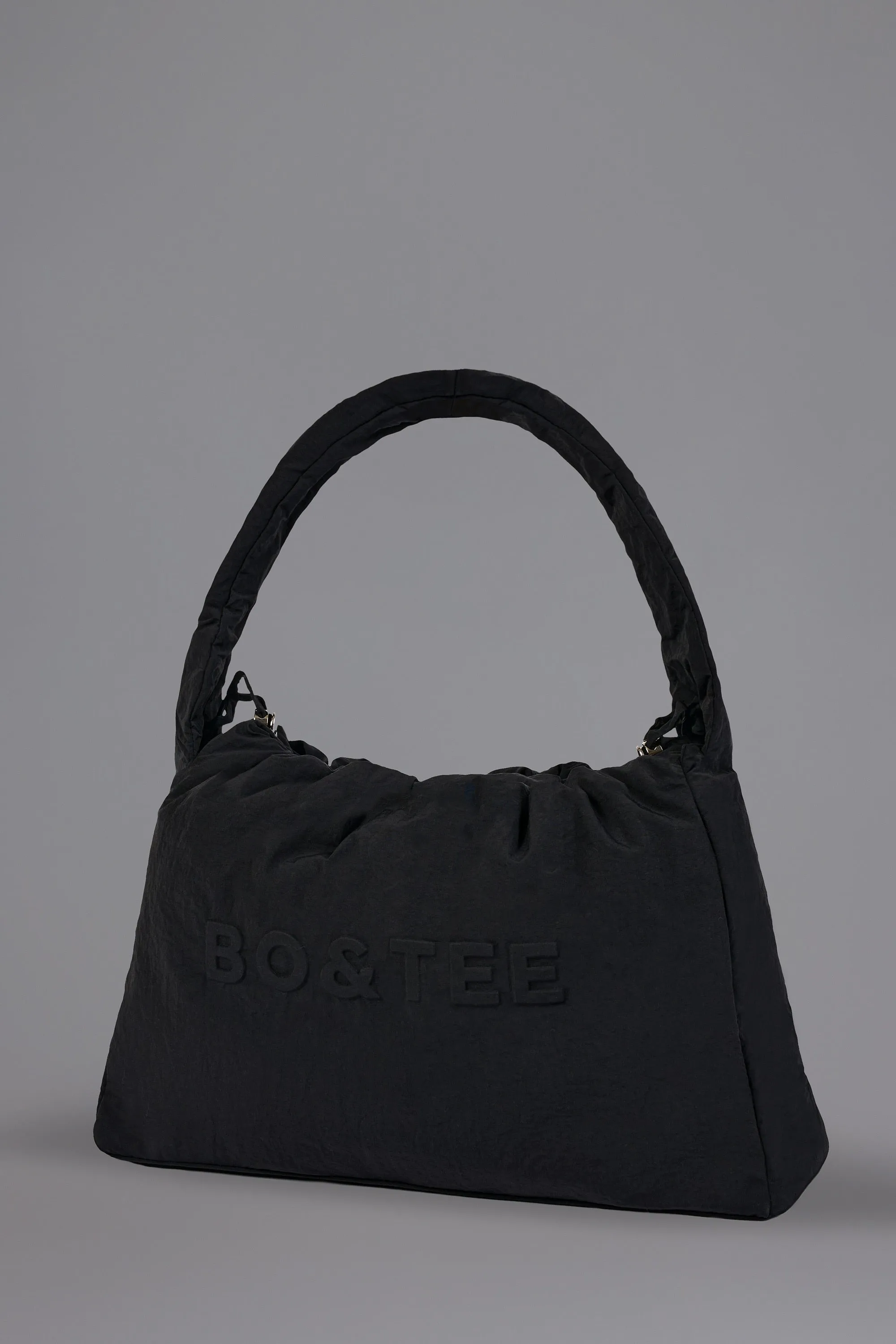 Drawstring Puffer Tote Bag in Black sold by Oh Polly product image thumbnail 4