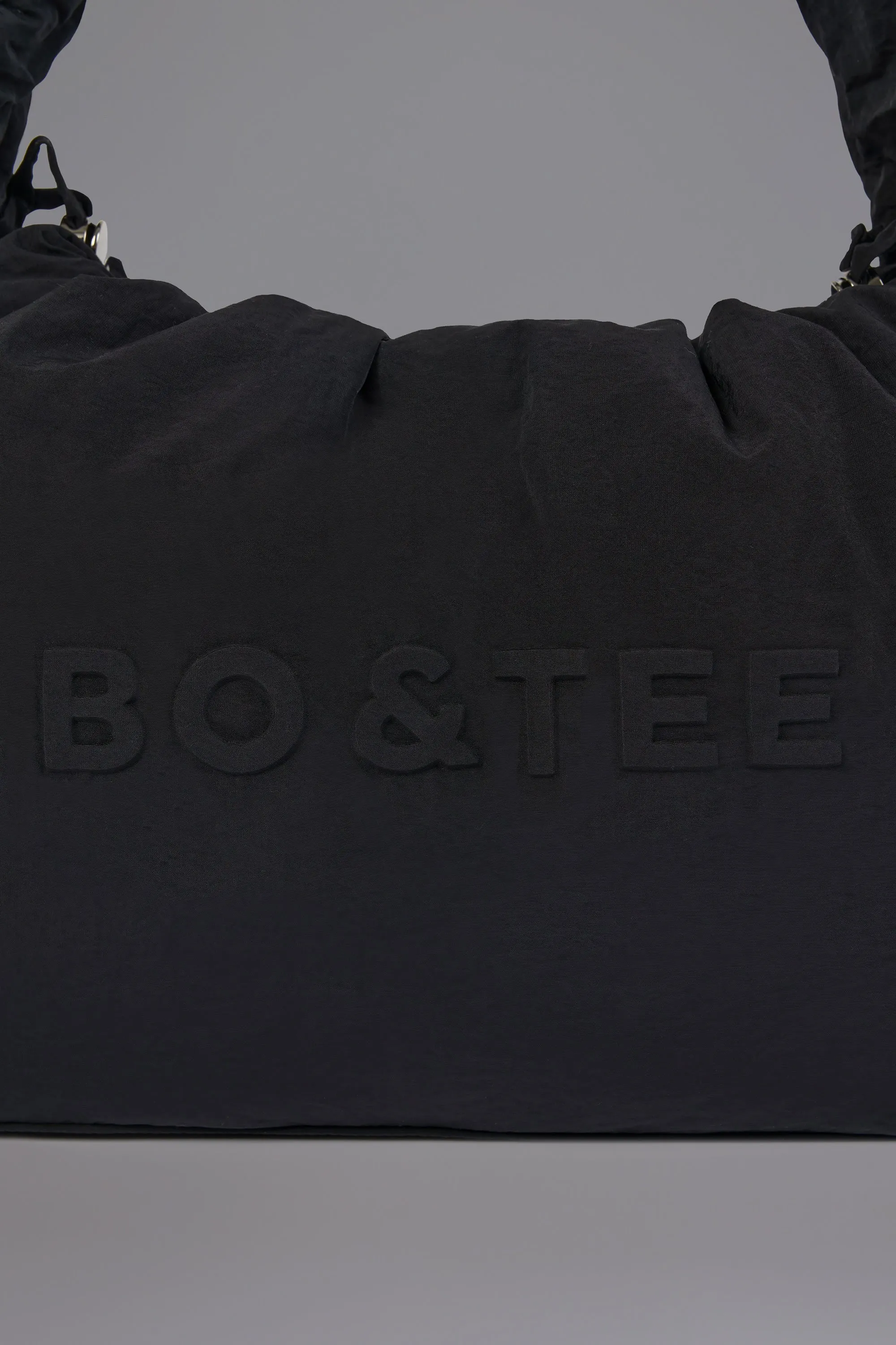 Drawstring Puffer Tote Bag in Black sold by Oh Polly product image thumbnail 5