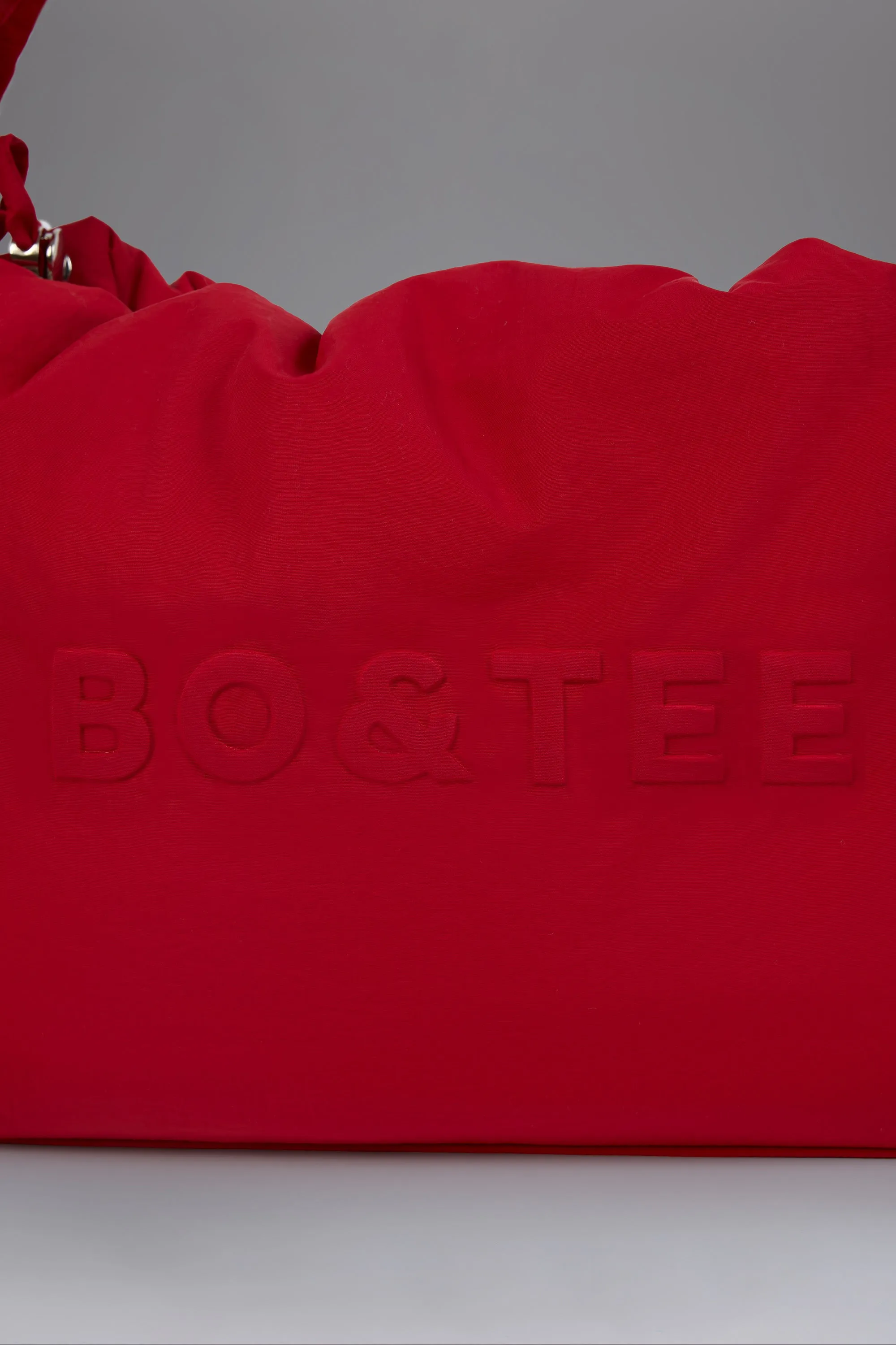 Drawstring Puffer Tote Bag in Cherry Red sold by Oh Polly product image thumbnail 5