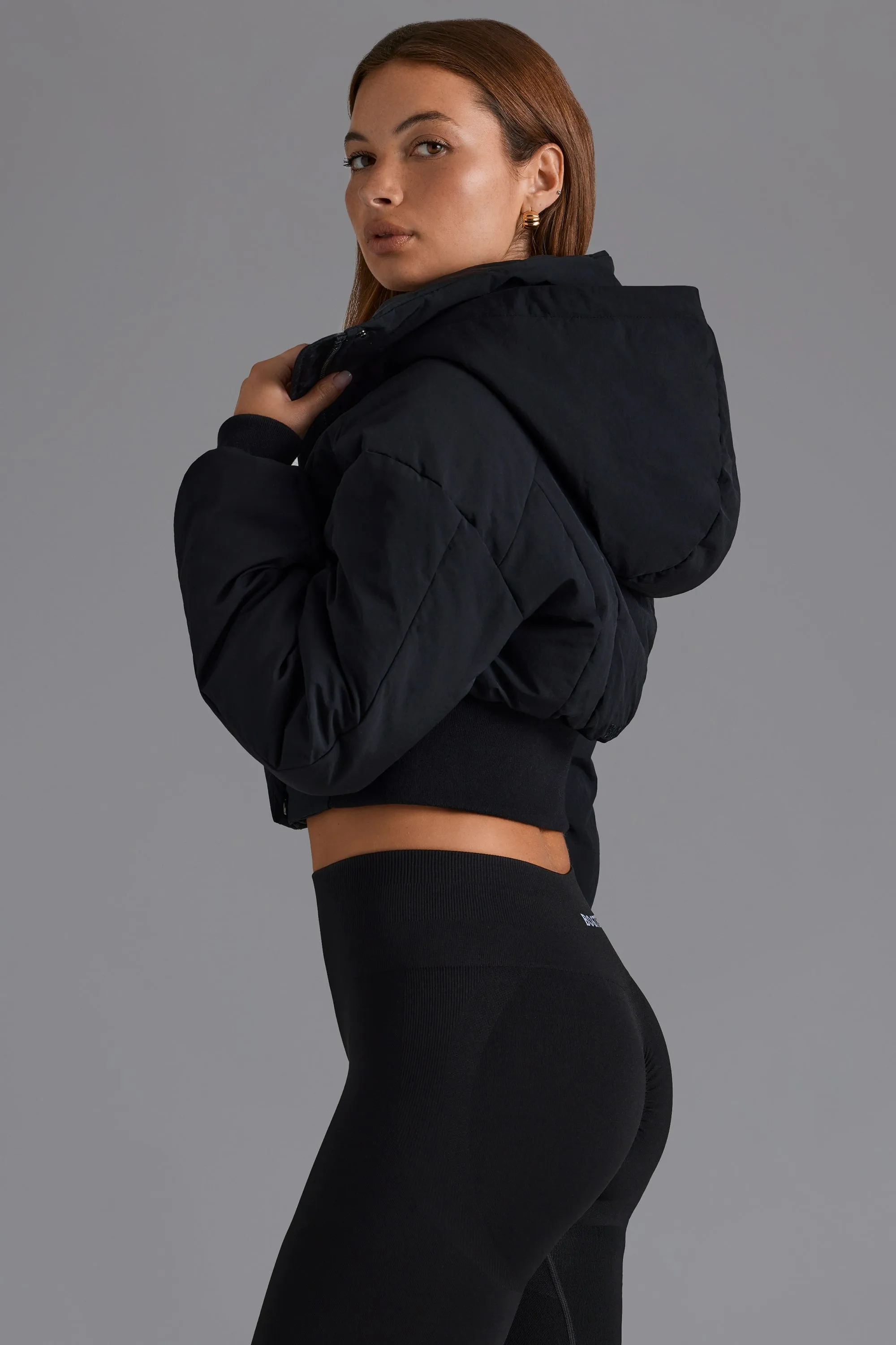 Contour Hooded Cropped Puffer Jacket in Black sold by Oh Polly product image thumbnail 3