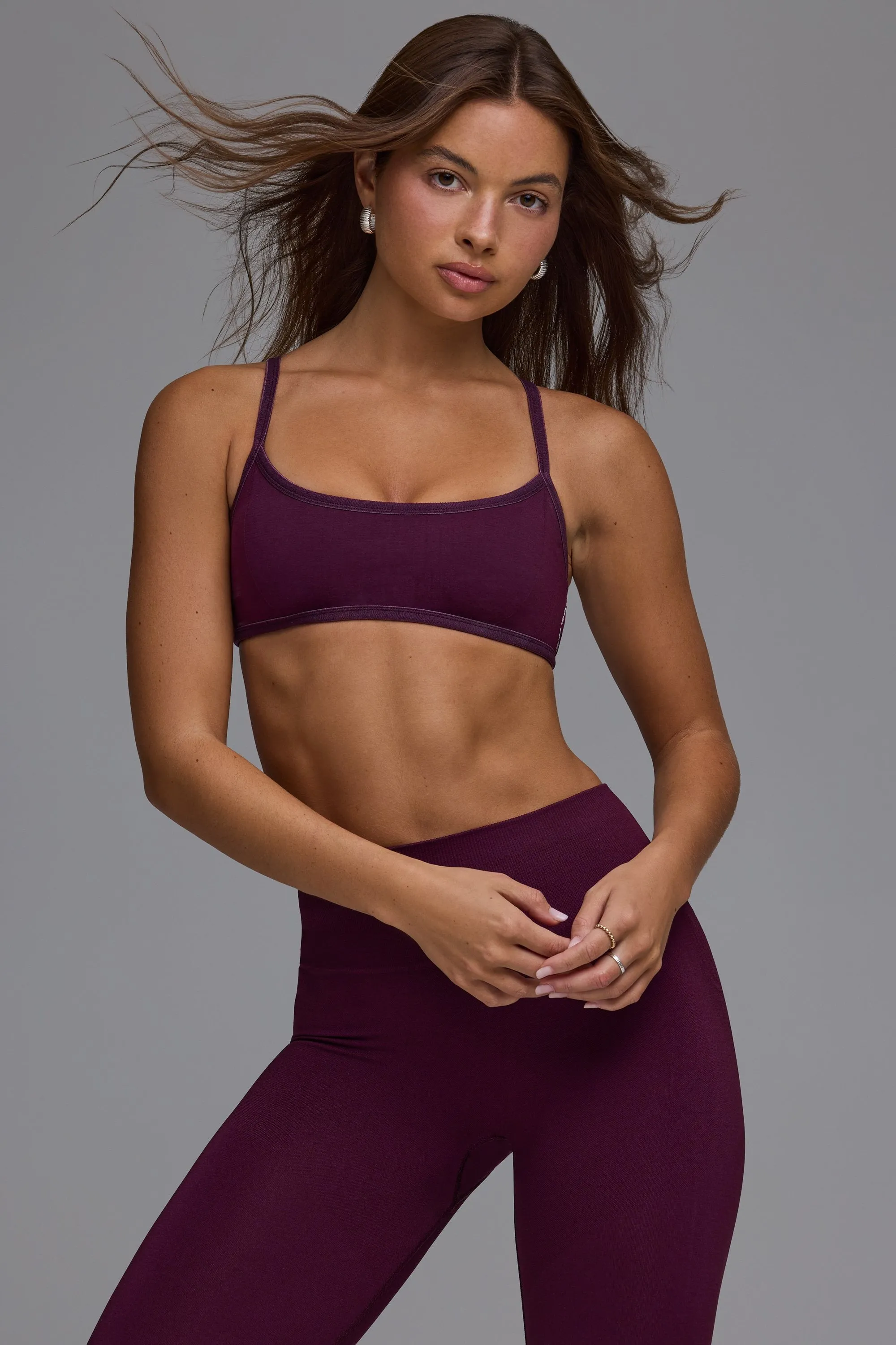Define Luxe Multiway Open-Back Sports Bra in Grape sold by Oh Polly