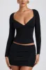 Modal Ruched Mid-Rise Mini Skirt in Black sold by Oh Polly