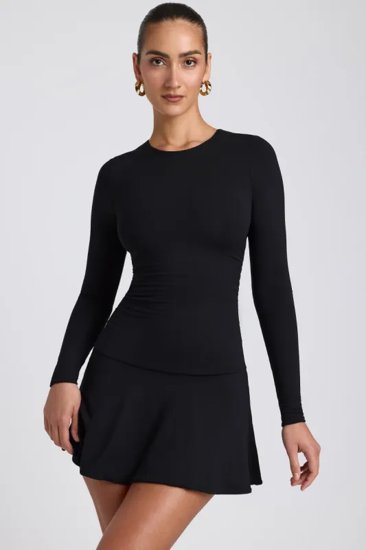 Modal Ruched Crew-Neck Mini Dress in Black sold by Oh Polly