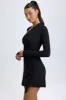 Modal Asymmetric A-Line Mini Dress in Black sold by Oh Polly