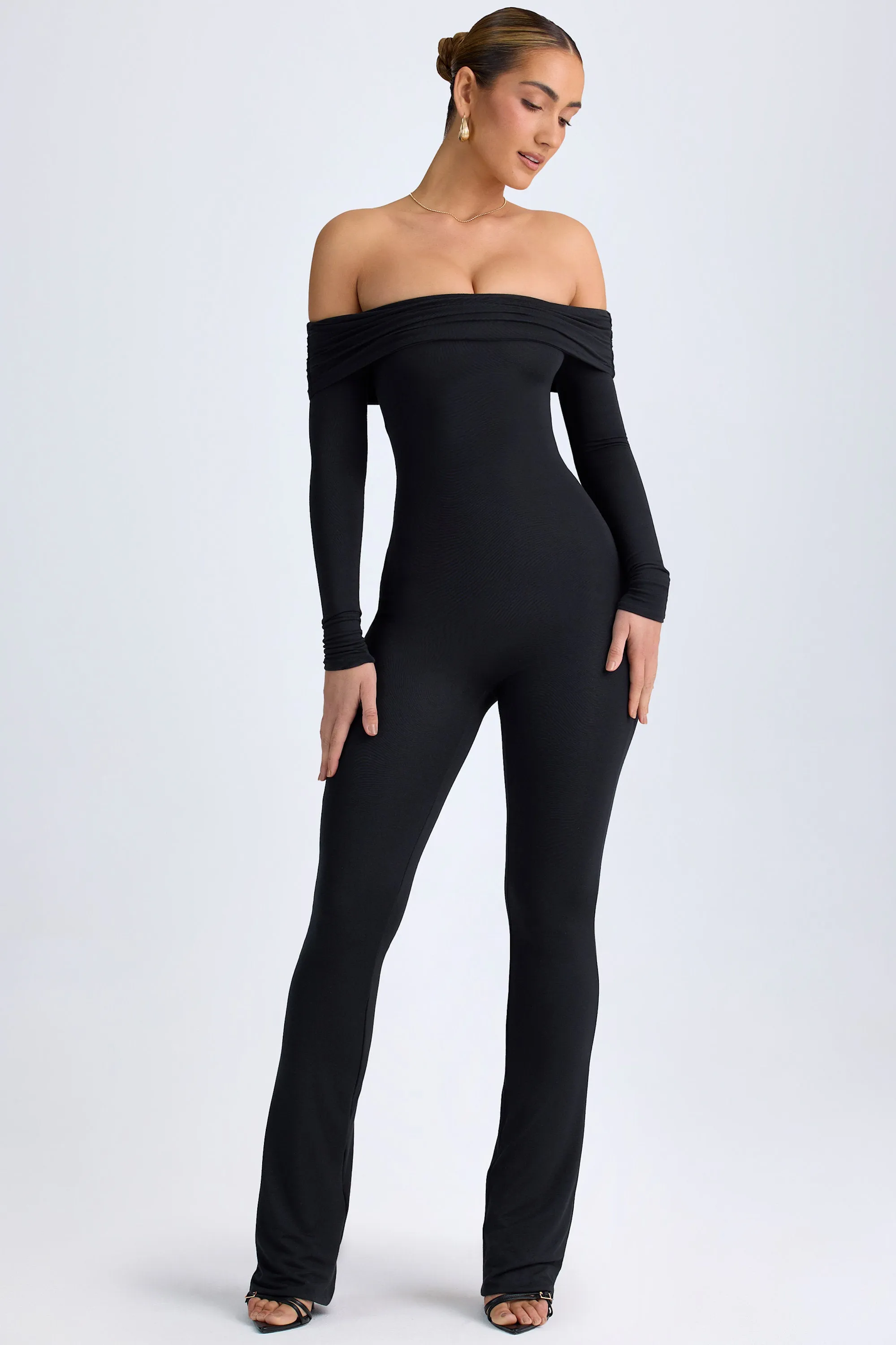 Petite Modal Off-Shoulder Ruched Jumpsuit in Black sold by Oh Polly