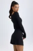 Modal Layered A-Line Mini Dress in Black sold by Oh Polly