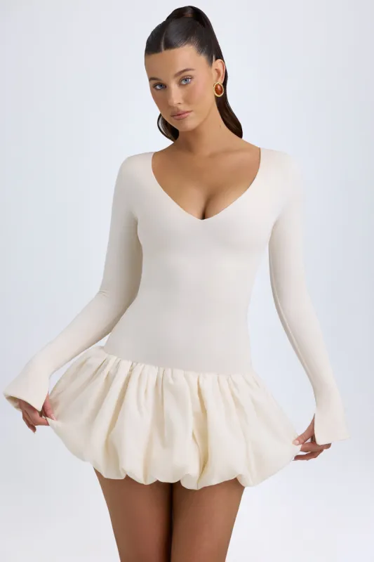 Modal Drop-Waist Bubble Hem Mini Dress in Ivory sold by Oh Polly