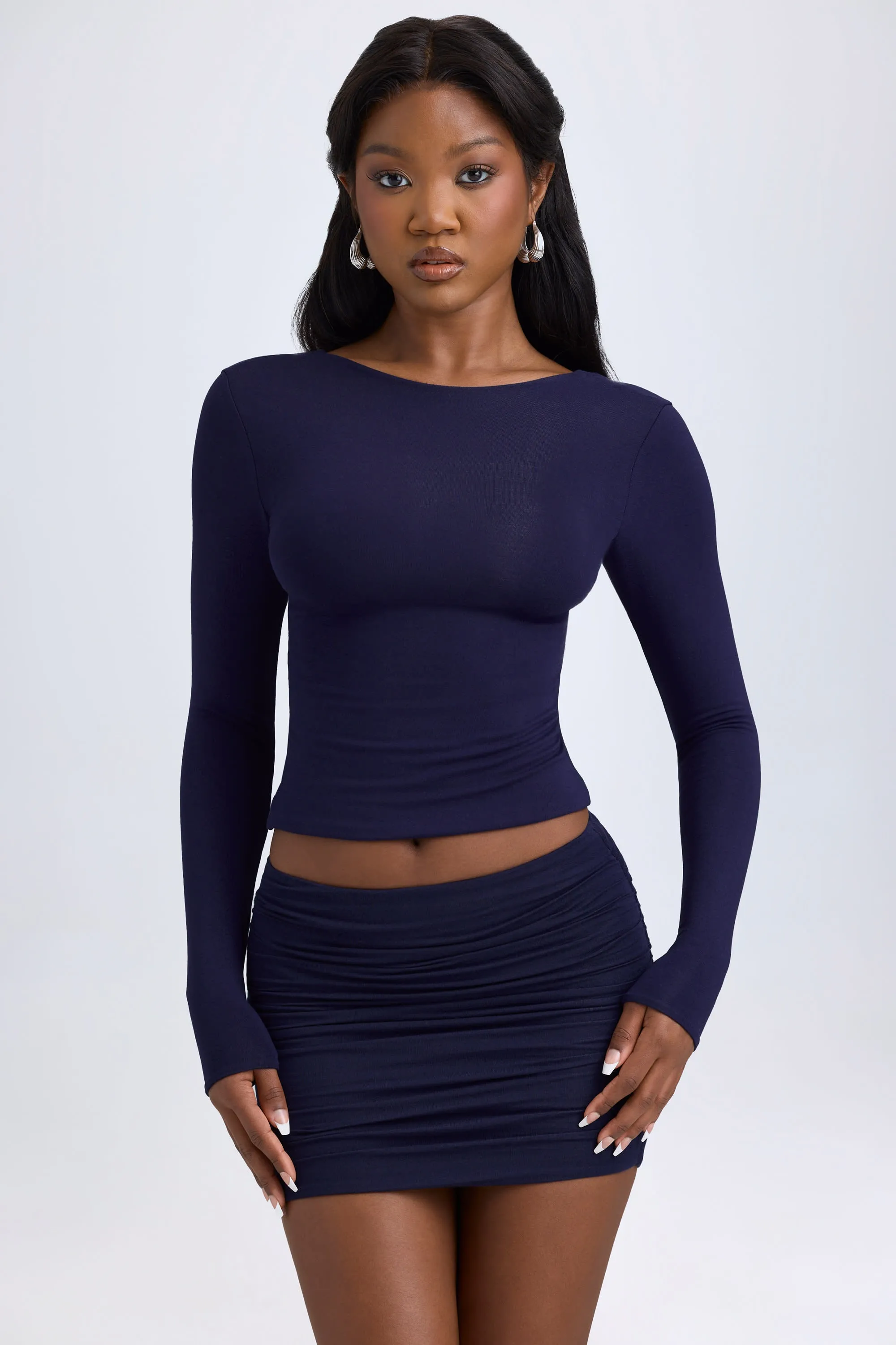 Modal Ruched Mid-Rise Mini Skirt in True Navy sold by Oh Polly