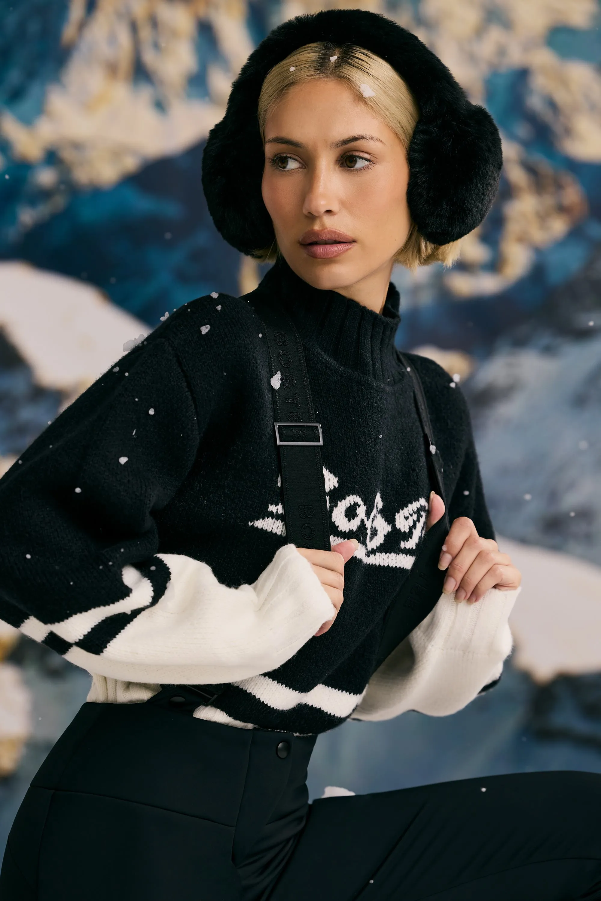 Faux-Fur Earmuffs in Black sold by Oh Polly