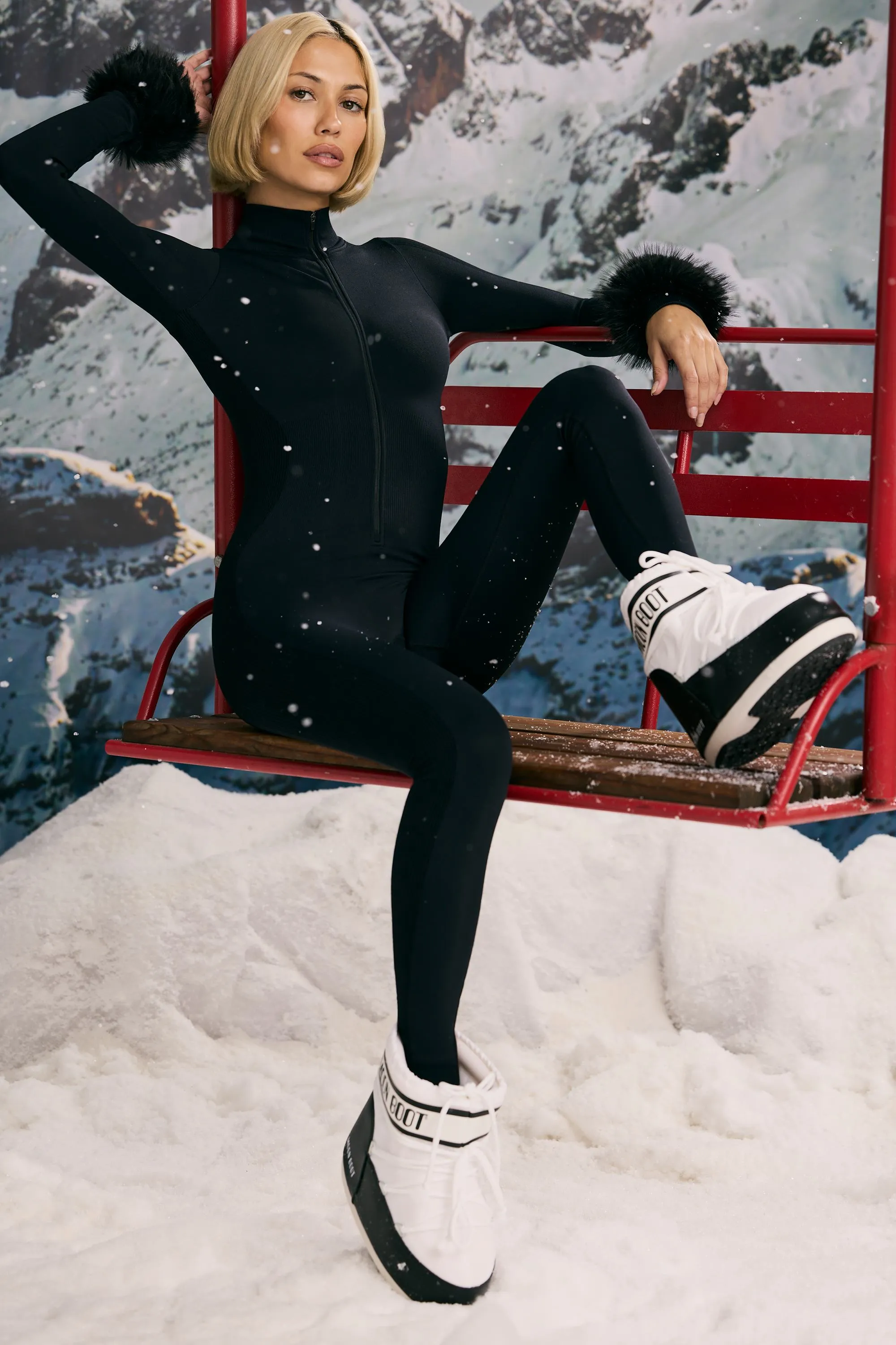 Petite Super Sculpt Seamless Base Layer Jumpsuit in Black sold by Oh Polly