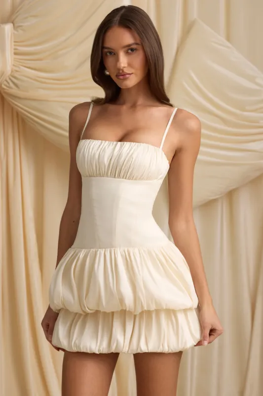 Layered Bubble Hem Corset Mini Dress in Ivory sold by Oh Polly