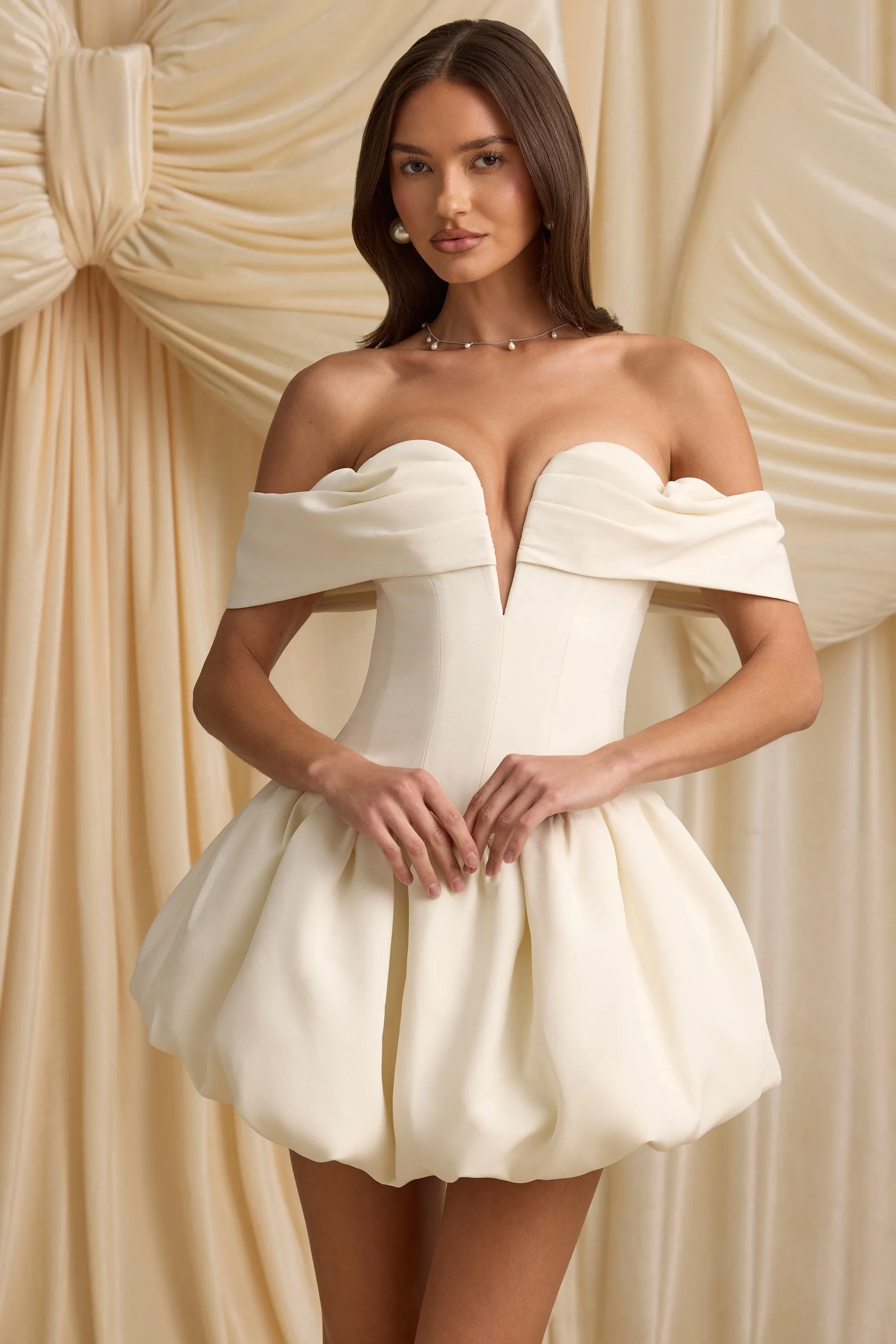 Off-Shoulder Layered Bubble Hem Corset Mini Dress in Ivory sold by Oh Polly