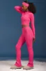Cable-Knit Flared Trousers in Hot Pink sold by Oh Polly