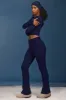 Cable-Knit Flared Trousers in Navy sold by Oh Polly