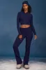 Cable-Knit Flared Trousers in Navy sold by Oh Polly