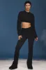 Cable-Knit Flared Trousers in Black sold by Oh Polly