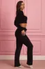 Fluffy Knit Wide-Leg Trousers in Black sold by Oh Polly