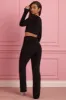 Fluffy Knit Wide-Leg Trousers in Black sold by Oh Polly