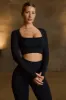 Super Sculpt Seamless Long-Sleeve Crop Top in Black sold by Oh Polly