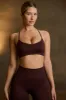 Super Sculpt Seamless Cross-Back Sports Bra in Chocolate sold by Oh Polly