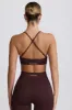 Super Sculpt Seamless Cross-Back Sports Bra in Chocolate sold by Oh Polly