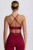 Super Sculpt Seamless Cross-Back Sports Bra in Burgundy sold by Oh Polly
