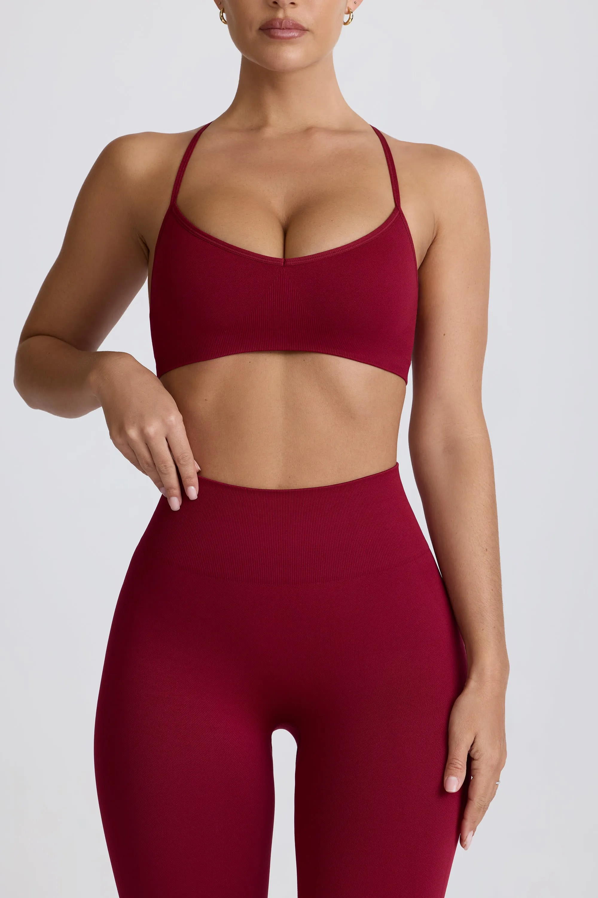 Super Sculpt Seamless Cross-Back Sports Bra in Burgundy sold by Oh Polly product image thumbnail 5