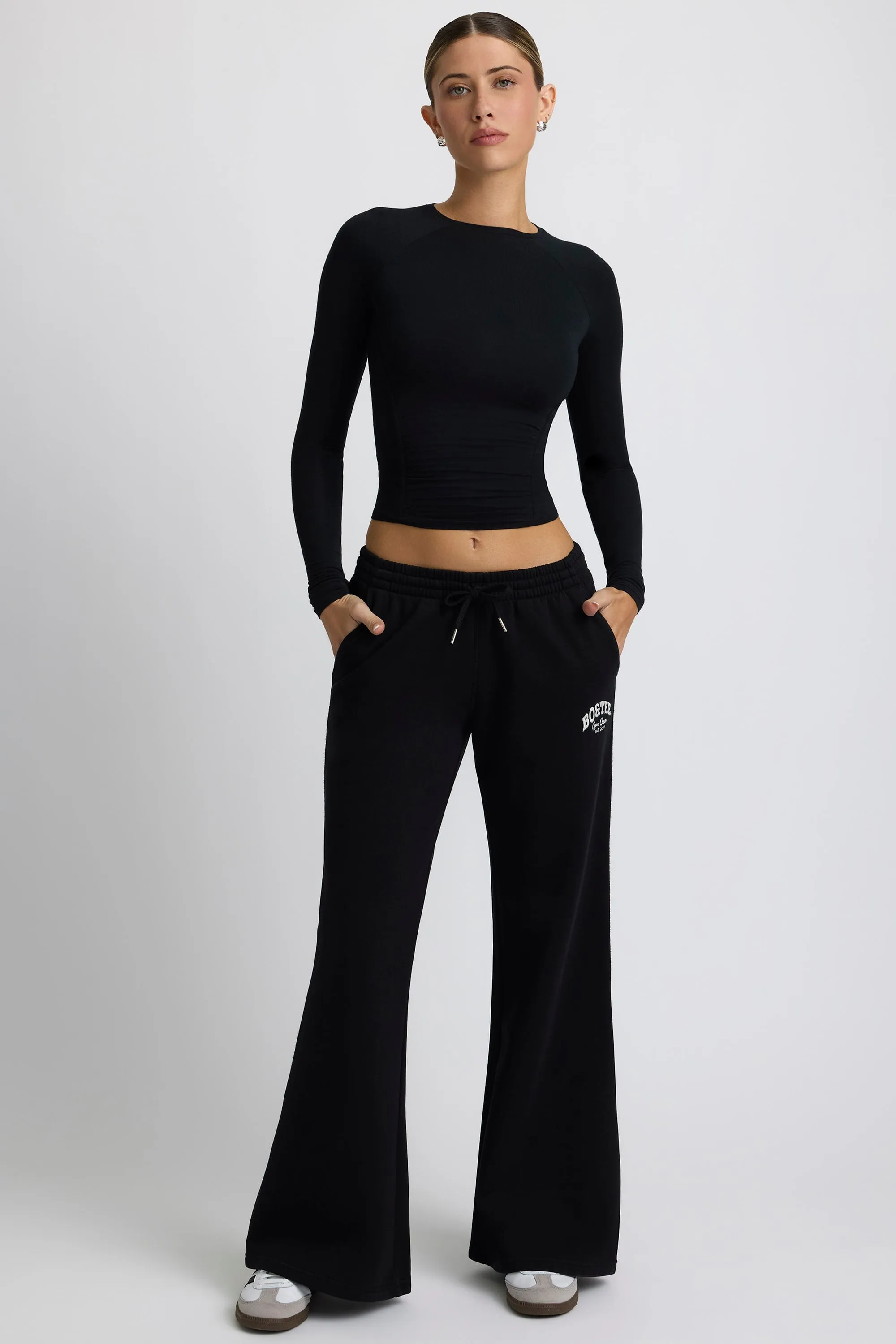 Low-Rise Wide-Leg Joggers in Black sold by Oh Polly