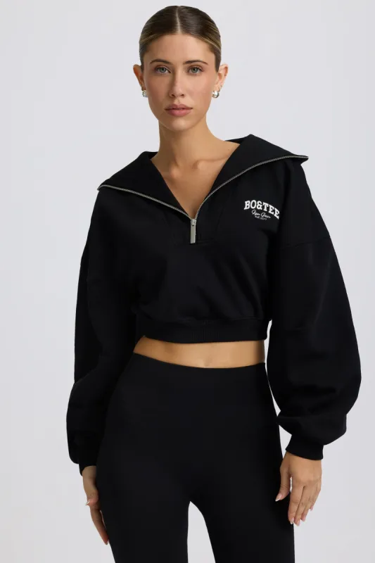 Quarter-Zip Cropped Sweatshirt in Black sold by Oh Polly