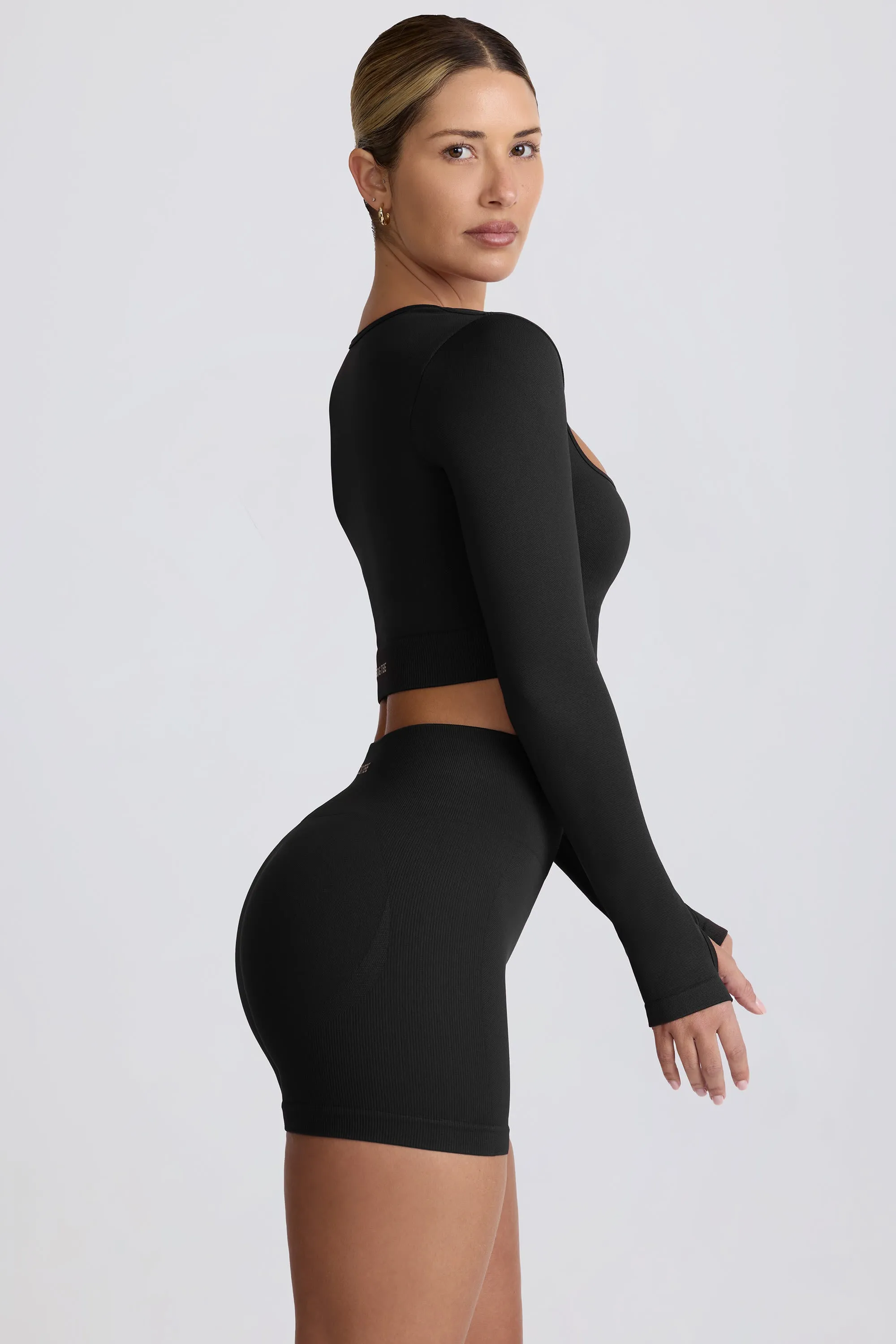 Super Sculpt Seamless High-Waist Mini Shorts in Black sold by Oh Polly product image thumbnail 4